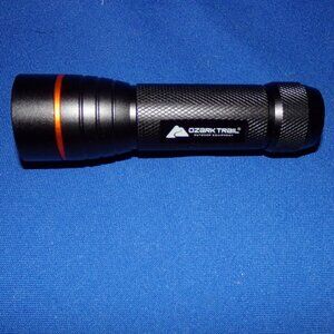 New - Ozark Trail 550 Lumens LED Flashlight, 4 AAA Batteries included